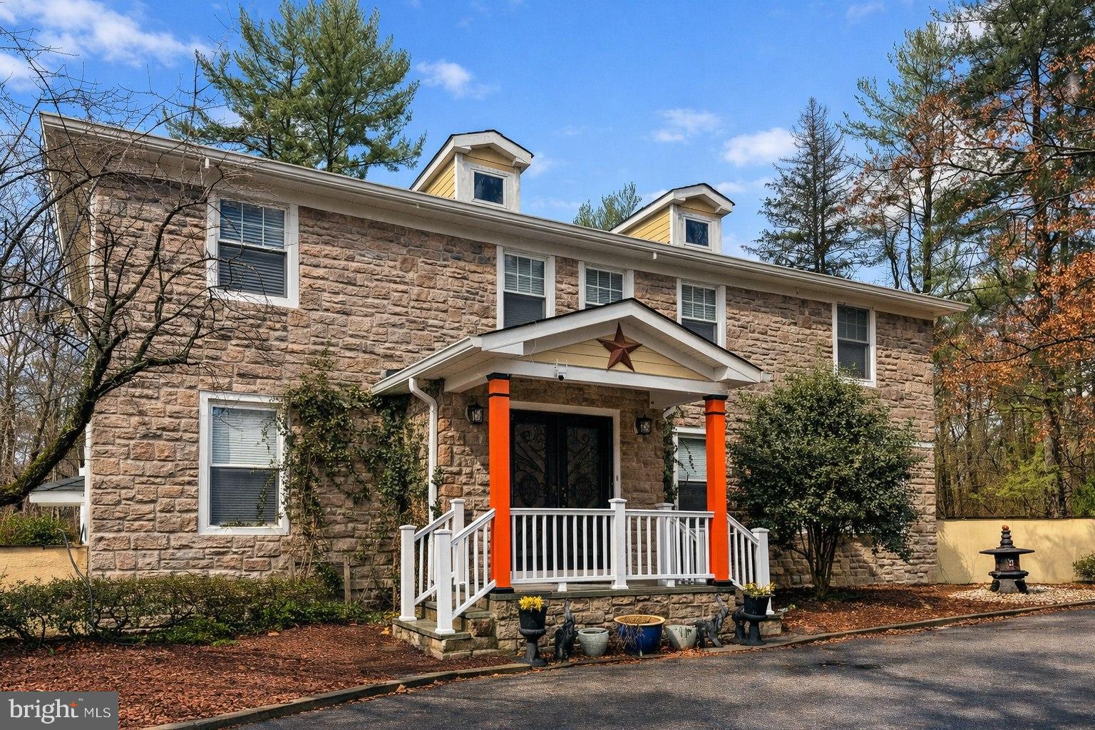 890 Lawrenceville Road Princeton, NJ 08540 - Photo 6 of 8 a front view of a house with a yard