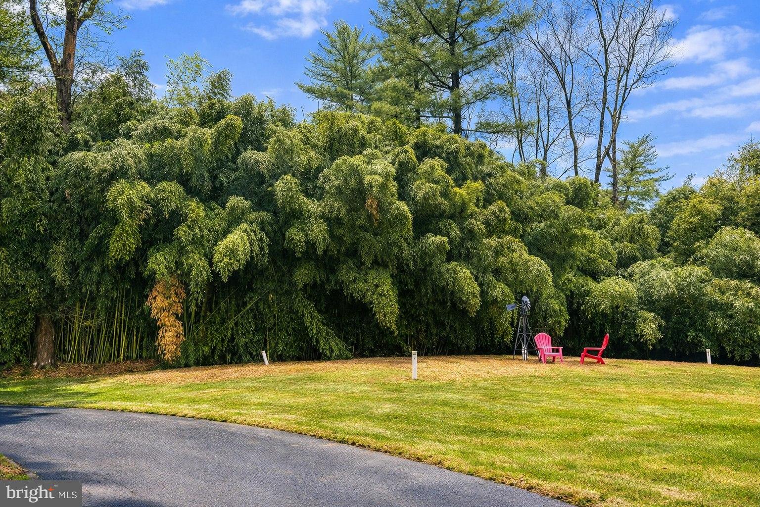 890 Lawrenceville Road Princeton, NJ 08540 - Photo 8 of 8 a view of a swimming pool with an outdoor space and seating area