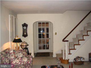 406 Hawthorne Road Wallingford, PA 19086 - Photo 3 of 6 a bedroom with furniture and a window