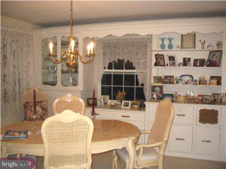 406 Hawthorne Road Wallingford, PA 19086 - Photo 4 of 6 a dining table chairs and a table