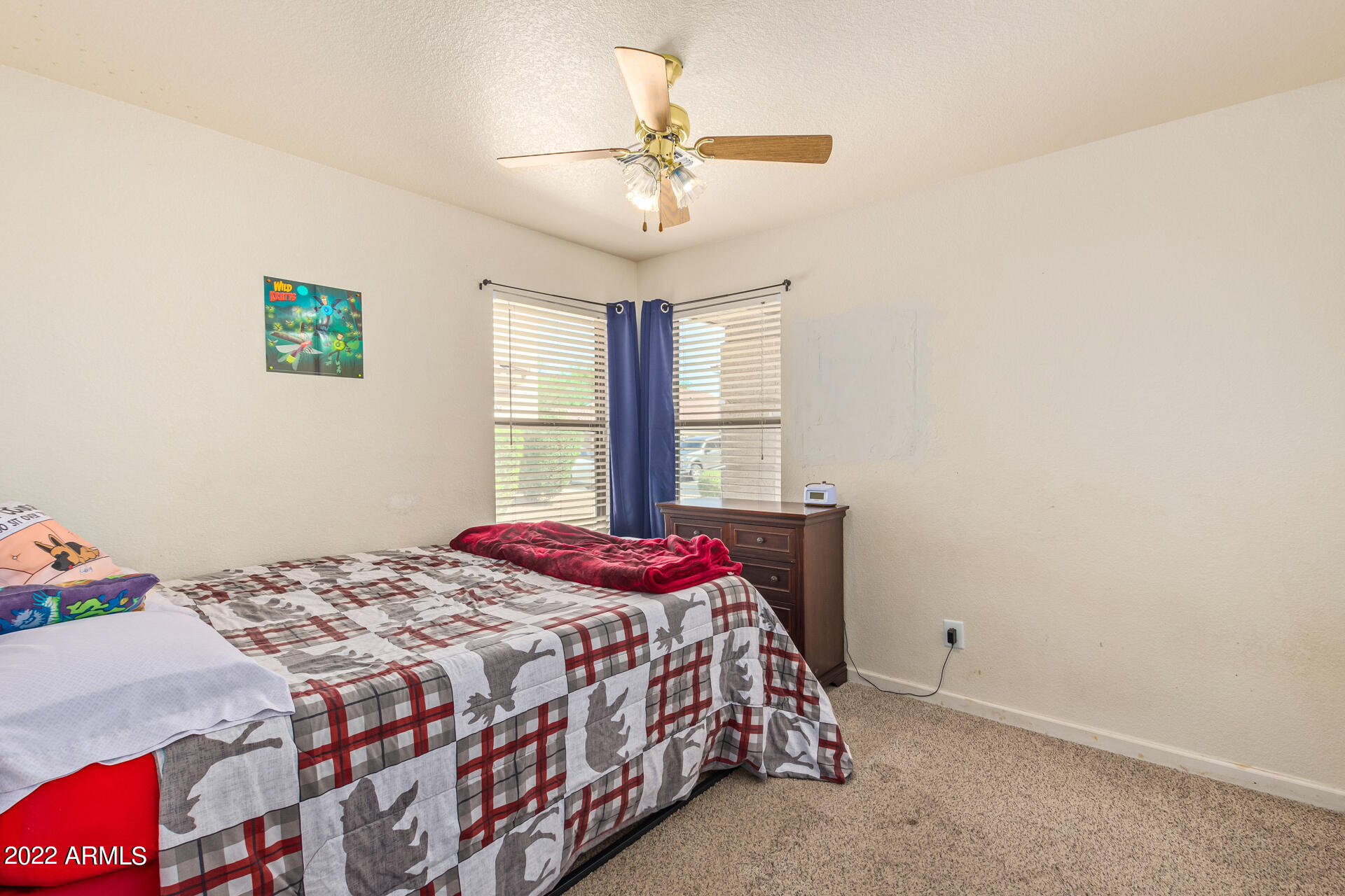 3466 South Chaparral Road Apache Junction, AZ 85119 - Photo 18 of 29 a bedroom with a bed and window