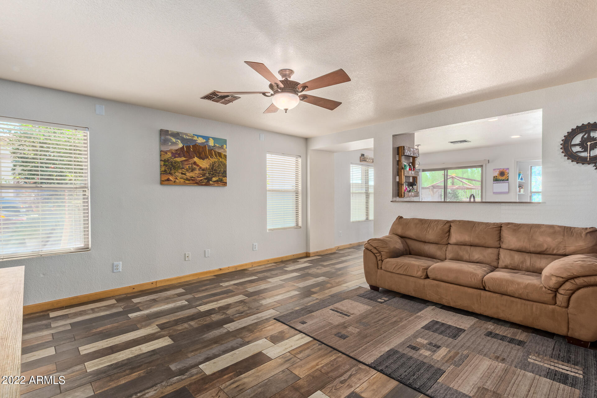3466 South Chaparral Road Apache Junction, AZ 85119 - Photo 4 of 29 a living room with furniture and a window