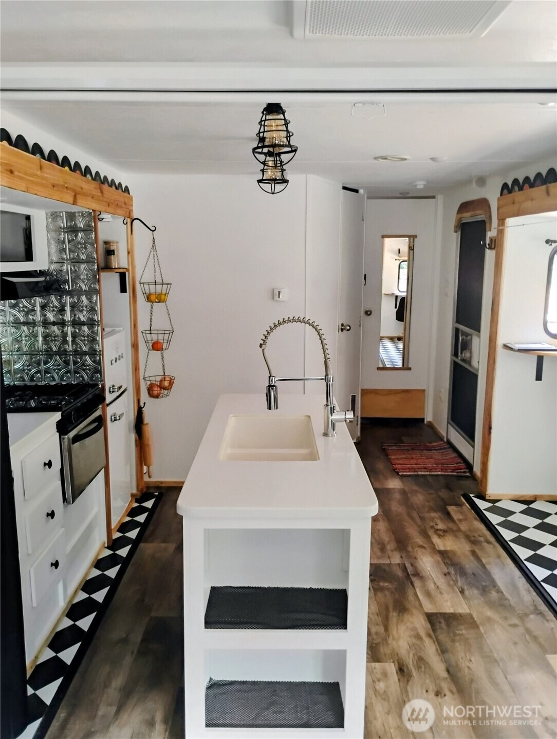 680 North Triton Heights Road Lilliwaup, WA 98555 - Photo 14 of 39 a bathroom with a sink a toilet and shower