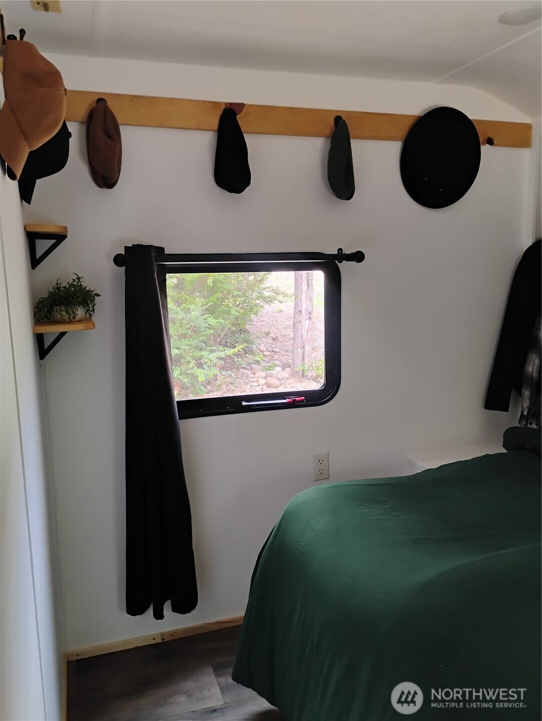 680 North Triton Heights Road Lilliwaup, WA 98555 - Photo 24 of 39 a view of a room with furniture and a window