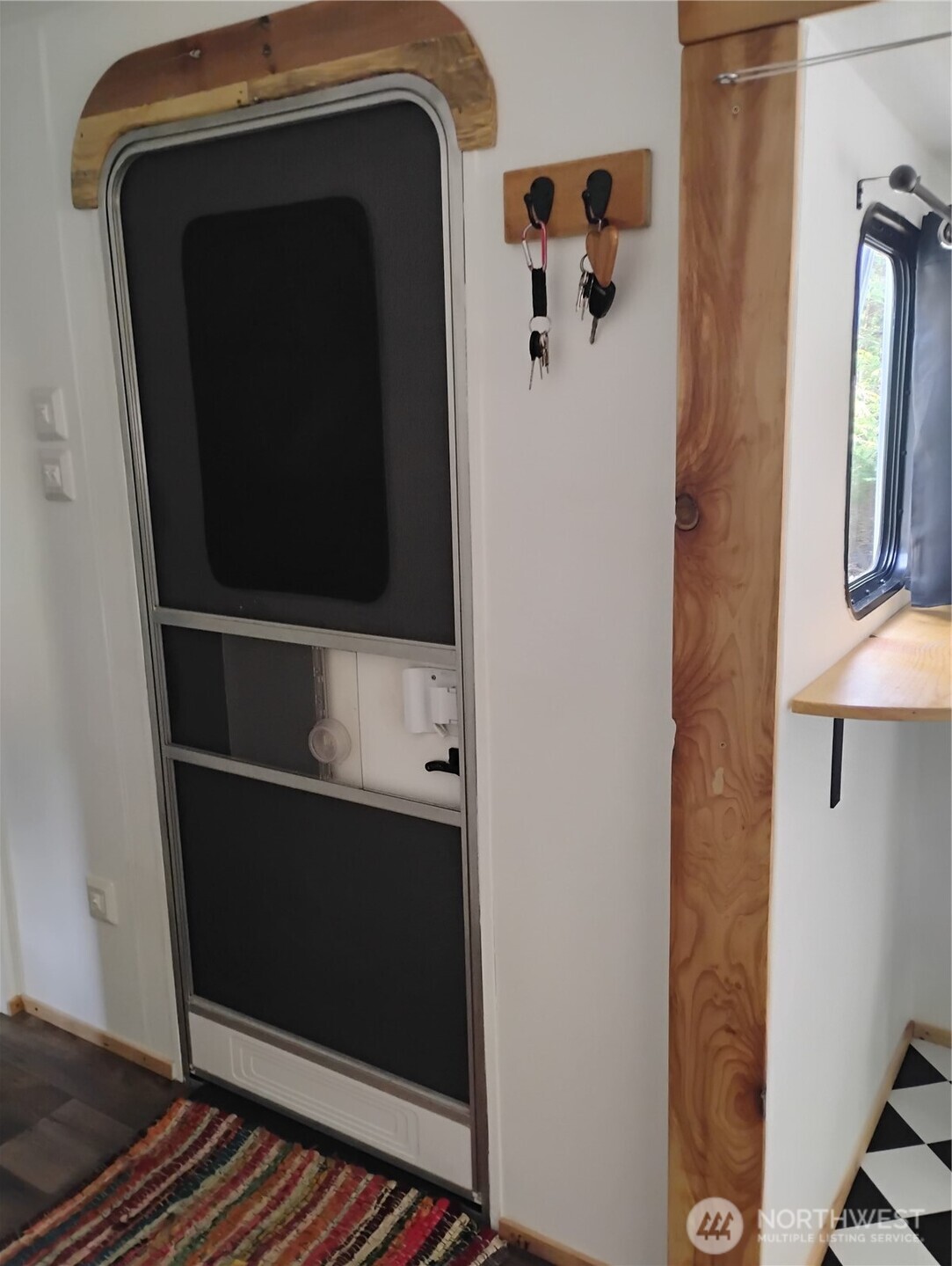 680 North Triton Heights Road Lilliwaup, WA 98555 - Photo 25 of 39 a bathroom with a sink and mirror