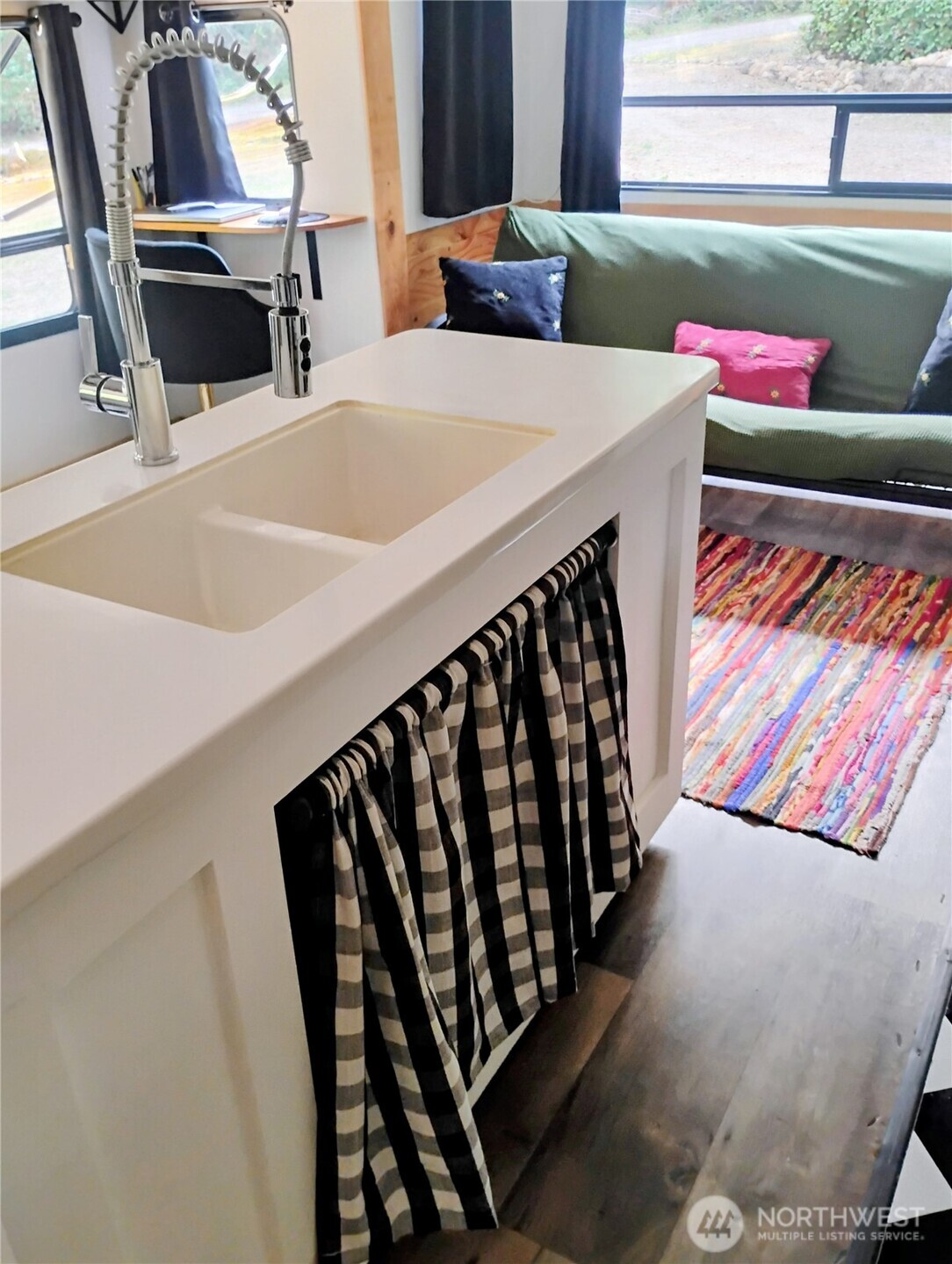 680 North Triton Heights Road Lilliwaup, WA 98555 - Photo 26 of 39 a bedroom with furniture and a window