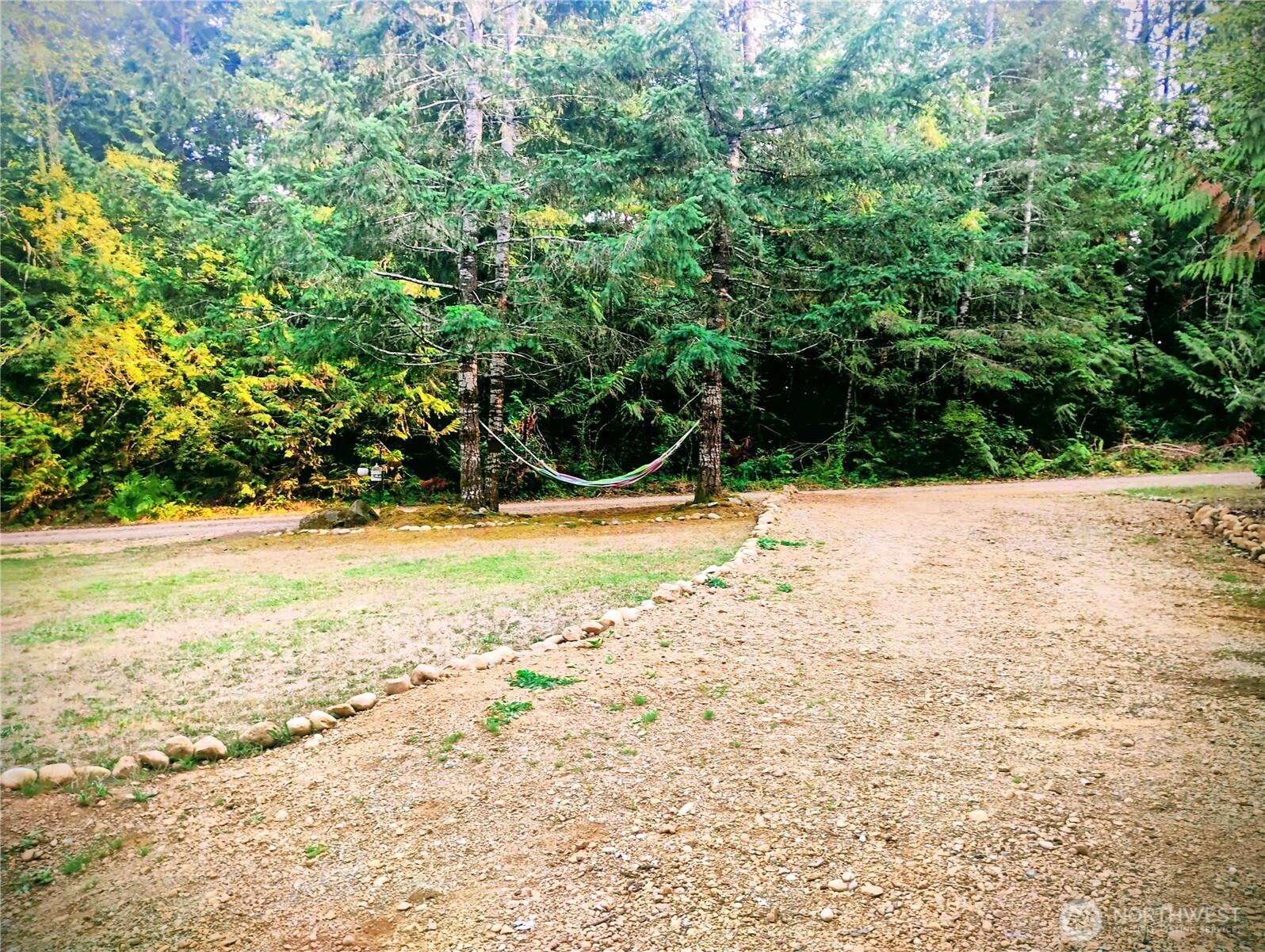 680 North Triton Heights Road Lilliwaup, WA 98555 - Photo 33 of 39 a view of swimming pool with an outdoor space