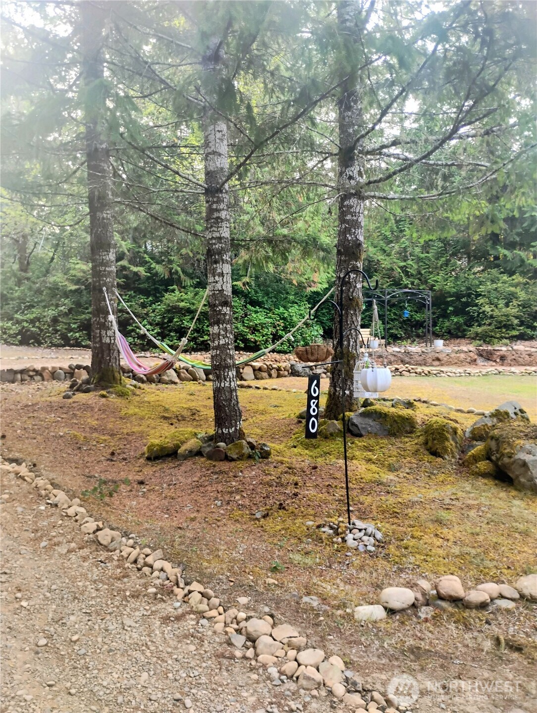 680 North Triton Heights Road Lilliwaup, WA 98555 - Photo 5 of 39 a view of a park with large trees