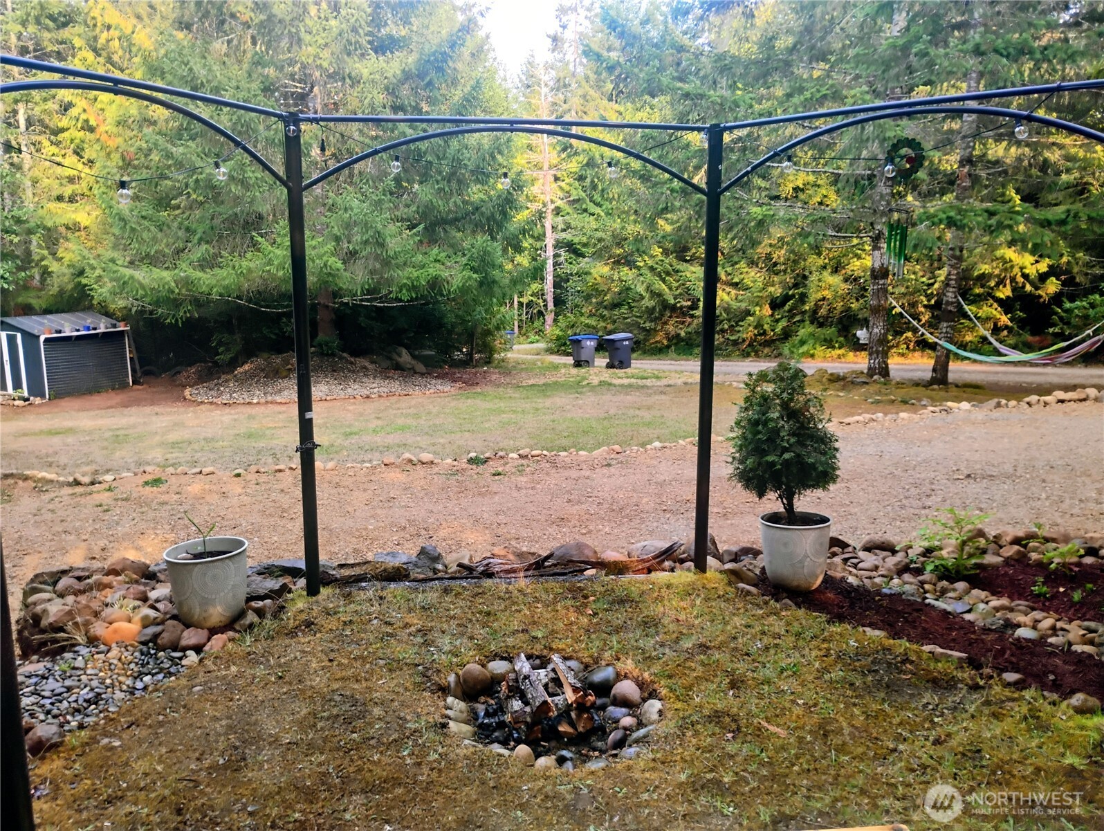 680 North Triton Heights Road Lilliwaup, WA 98555 - Photo 10 of 39 a view of a yard