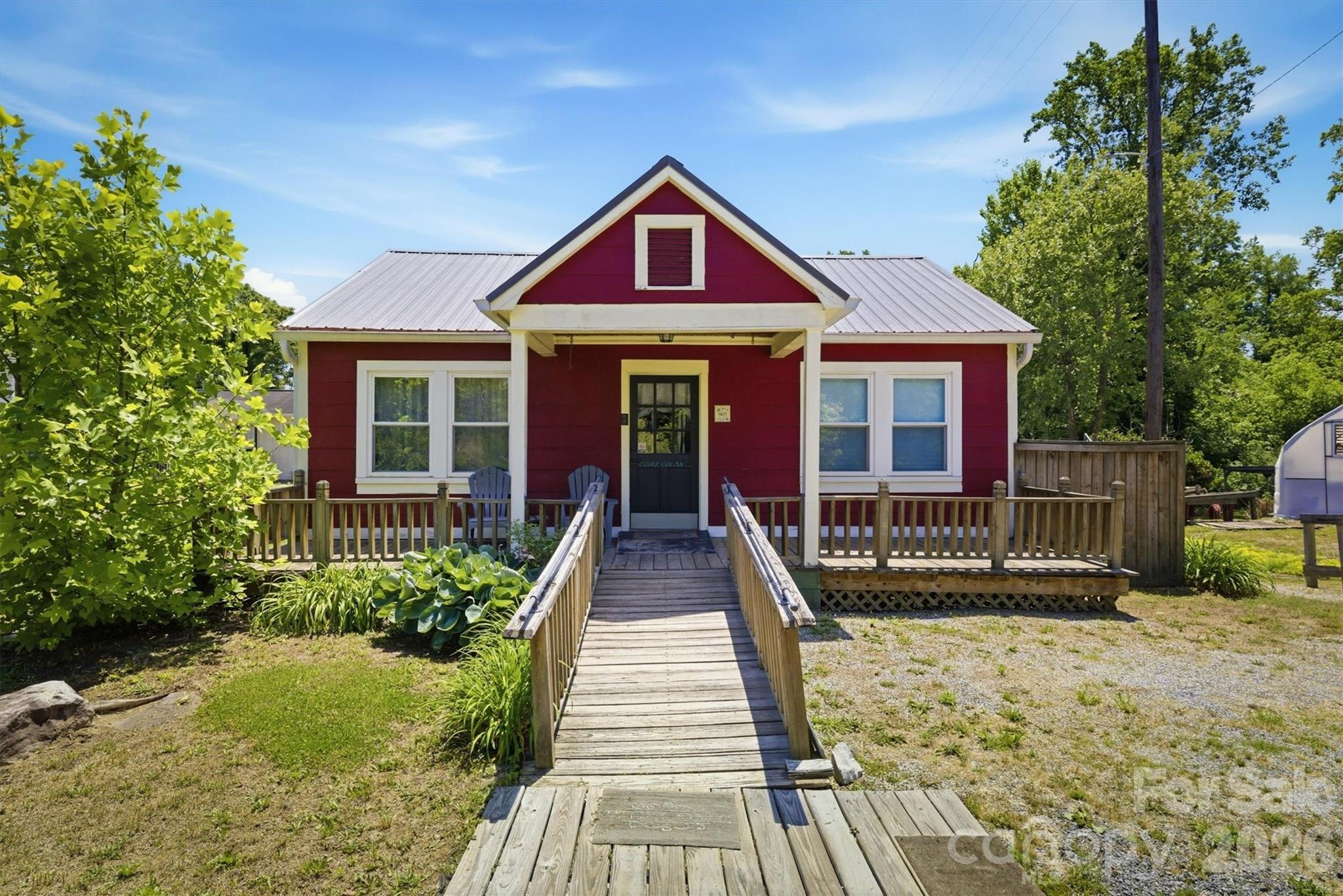 905 Carbon City Road Morganton, NC 28655 - Photo 2 of 29 a front view of a house with a yard