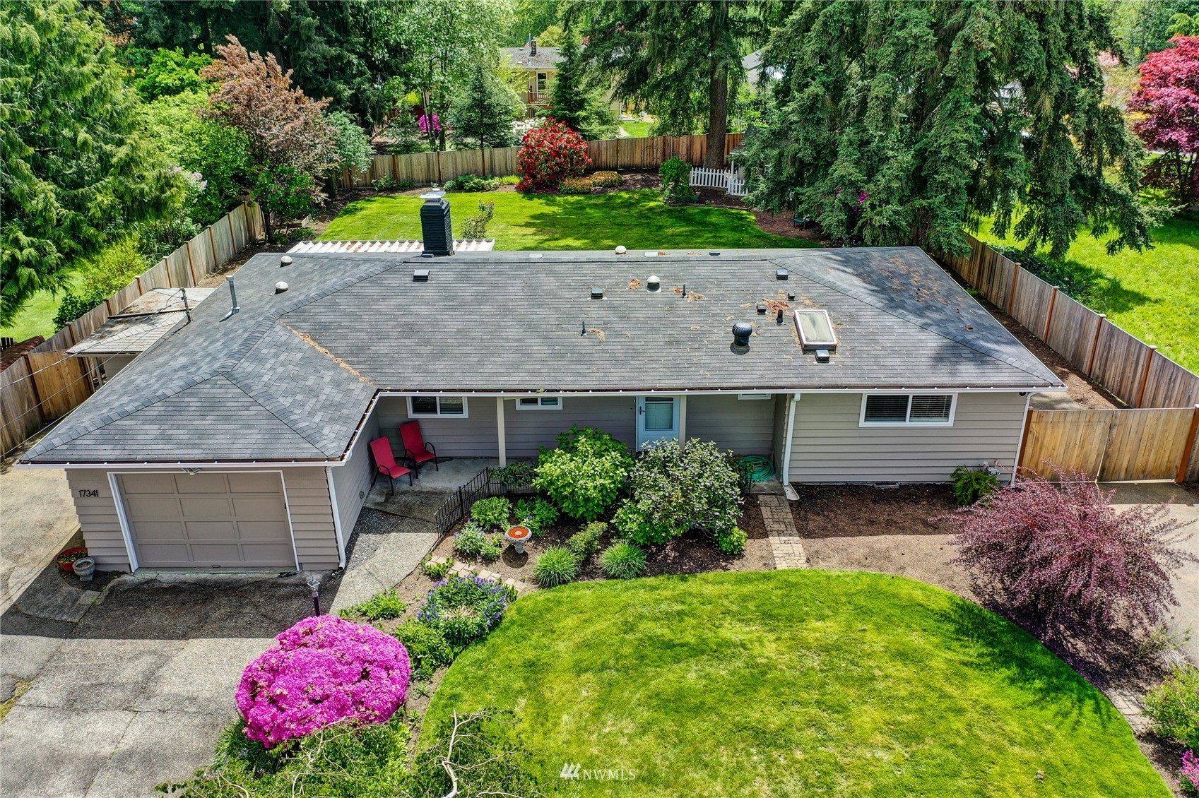 17341 Southeast 134th Street Renton, WA 98059 - Photo 1 of 36 a view of a house with a big yard and large trees