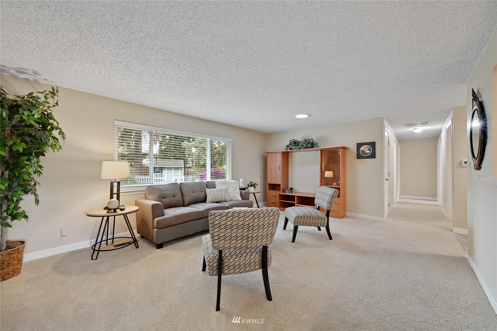 17341 Southeast 134th Street Renton, WA 98059 - Photo 6 of 36 a living room with furniture and a large window