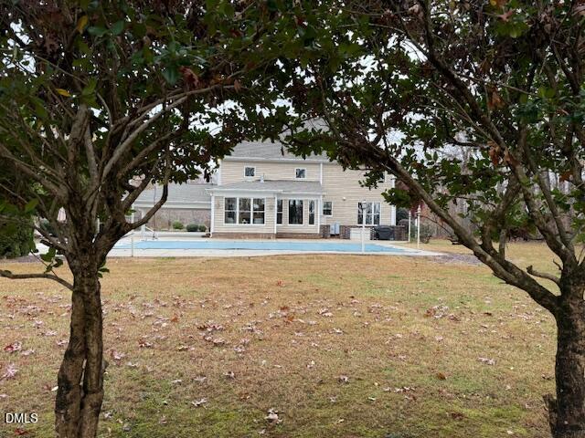 534 Dink Ashley Road Timberlake, NC 27583 - Photo 11 of 86 a front view of a house with large trees
