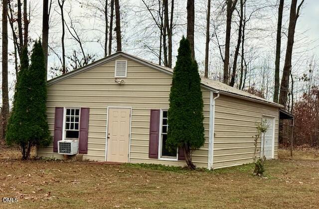534 Dink Ashley Road Timberlake, NC 27583 - Photo 13 of 86 a view of a house with a yard