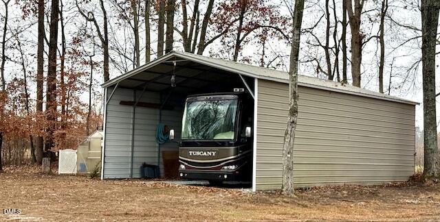 534 Dink Ashley Road Timberlake, NC 27583 - Photo 14 of 86 a view of a house with a door