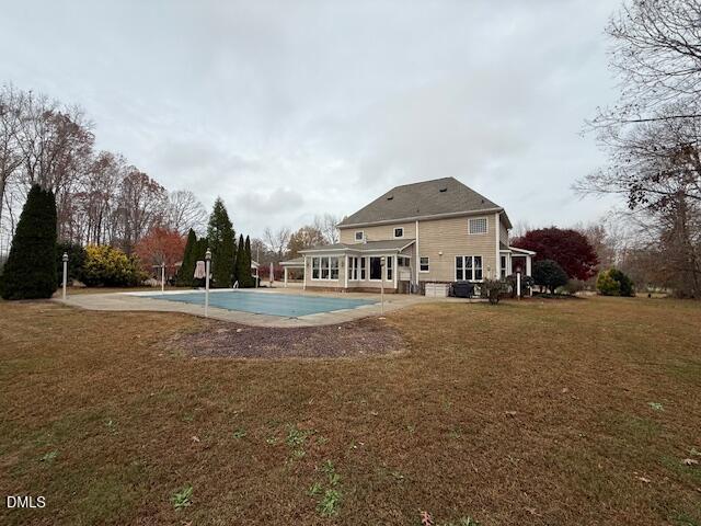 534 Dink Ashley Road Timberlake, NC 27583 - Photo 19 of 86 a view of house with yard in front of it