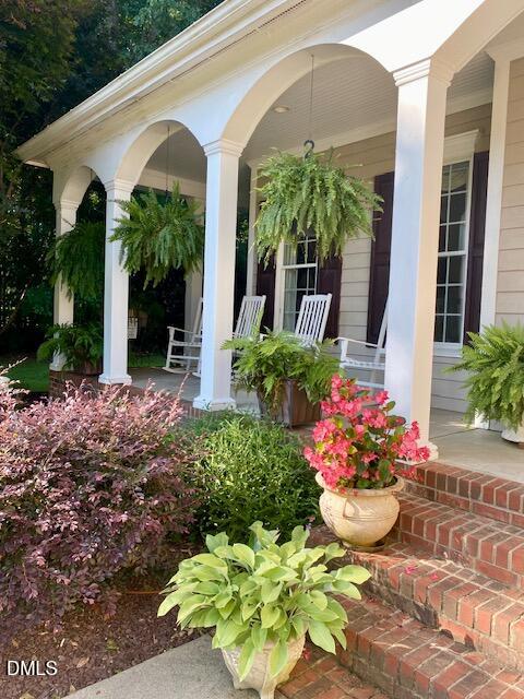 534 Dink Ashley Road Timberlake, NC 27583 - Photo 22 of 86 a front view of a house with a yard