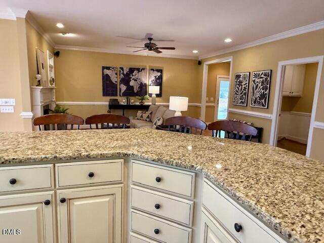 534 Dink Ashley Road Timberlake, NC 27583 - Photo 30 of 86 a kitchen with granite countertop a sink and cabinets