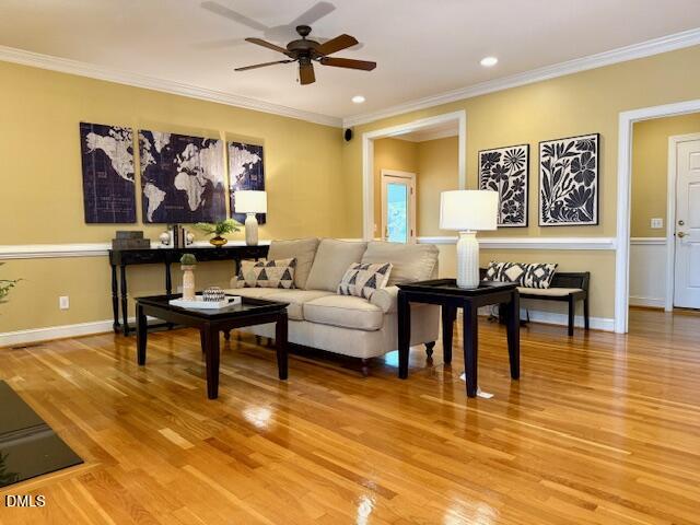 534 Dink Ashley Road Timberlake, NC 27583 - Photo 35 of 86 a living room with furniture and a flat screen tv
