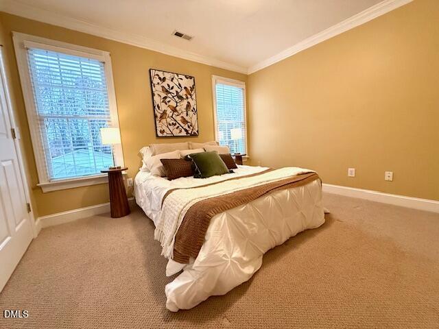 534 Dink Ashley Road Timberlake, NC 27583 - Photo 65 of 86 a bedroom with a bed and a large window
