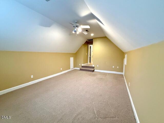 534 Dink Ashley Road Timberlake, NC 27583 - Photo 71 of 86 an empty room with a ceiling fan and a rug