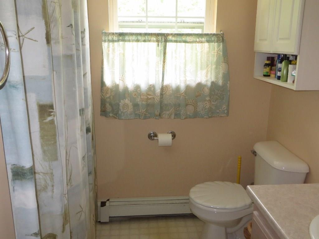 650 Townhouse Road East Waterboro, ME 04030 - Photo 8 of 19 Full bathroom with tub.