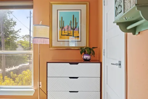 a view of a workspace with furniture