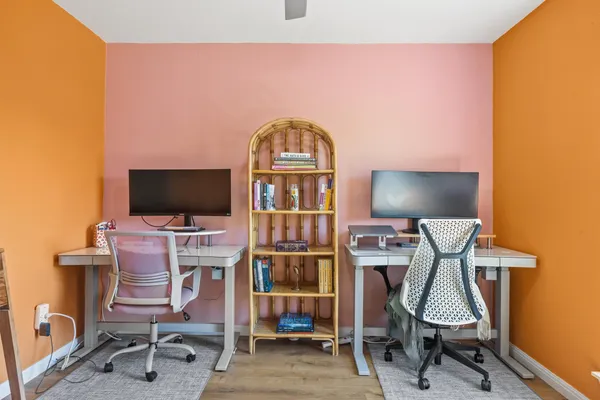a workspace with furniture and window