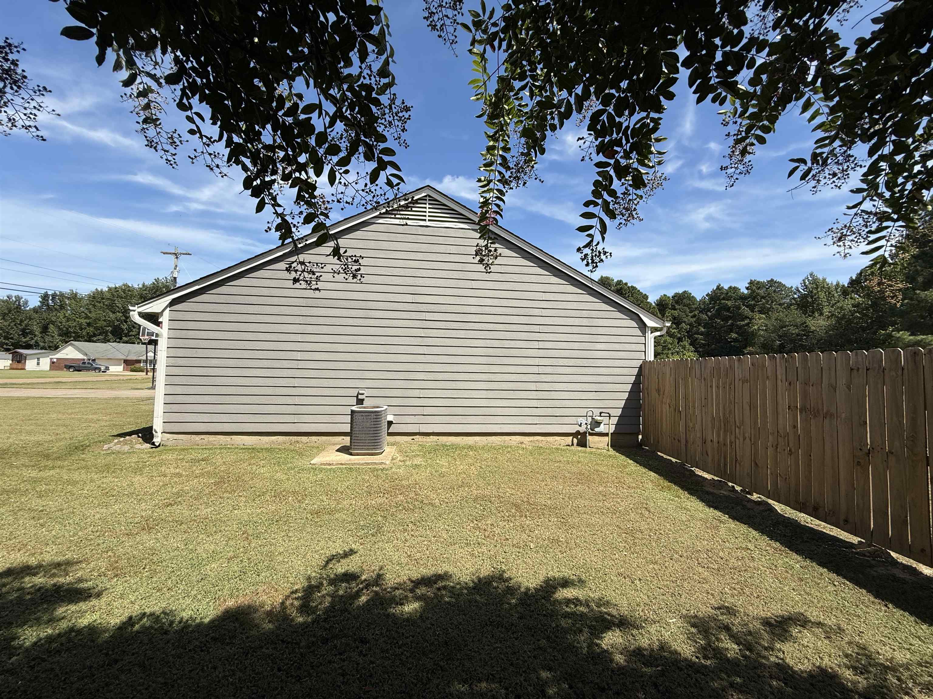 663 Tracy Road Millington, TN 38053 - Photo 6 of 21 View of side of home with a central AC unit