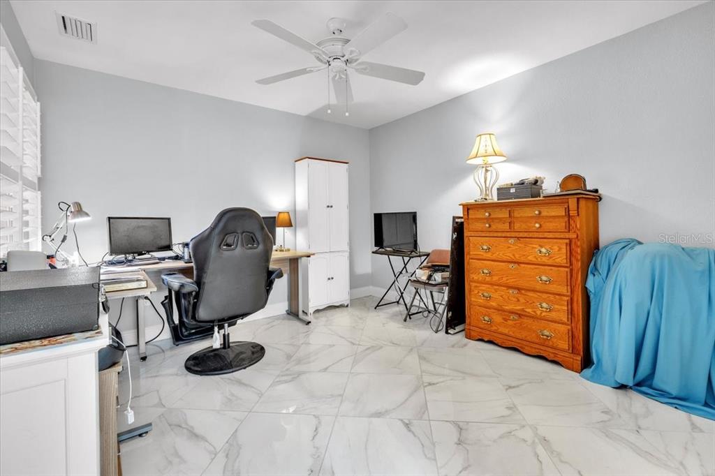 1260 Rio De Janeiro Avenue, Unit 102 Punta Gorda, FL 33983 - Photo 28 of 46 a view of a workspace with furniture