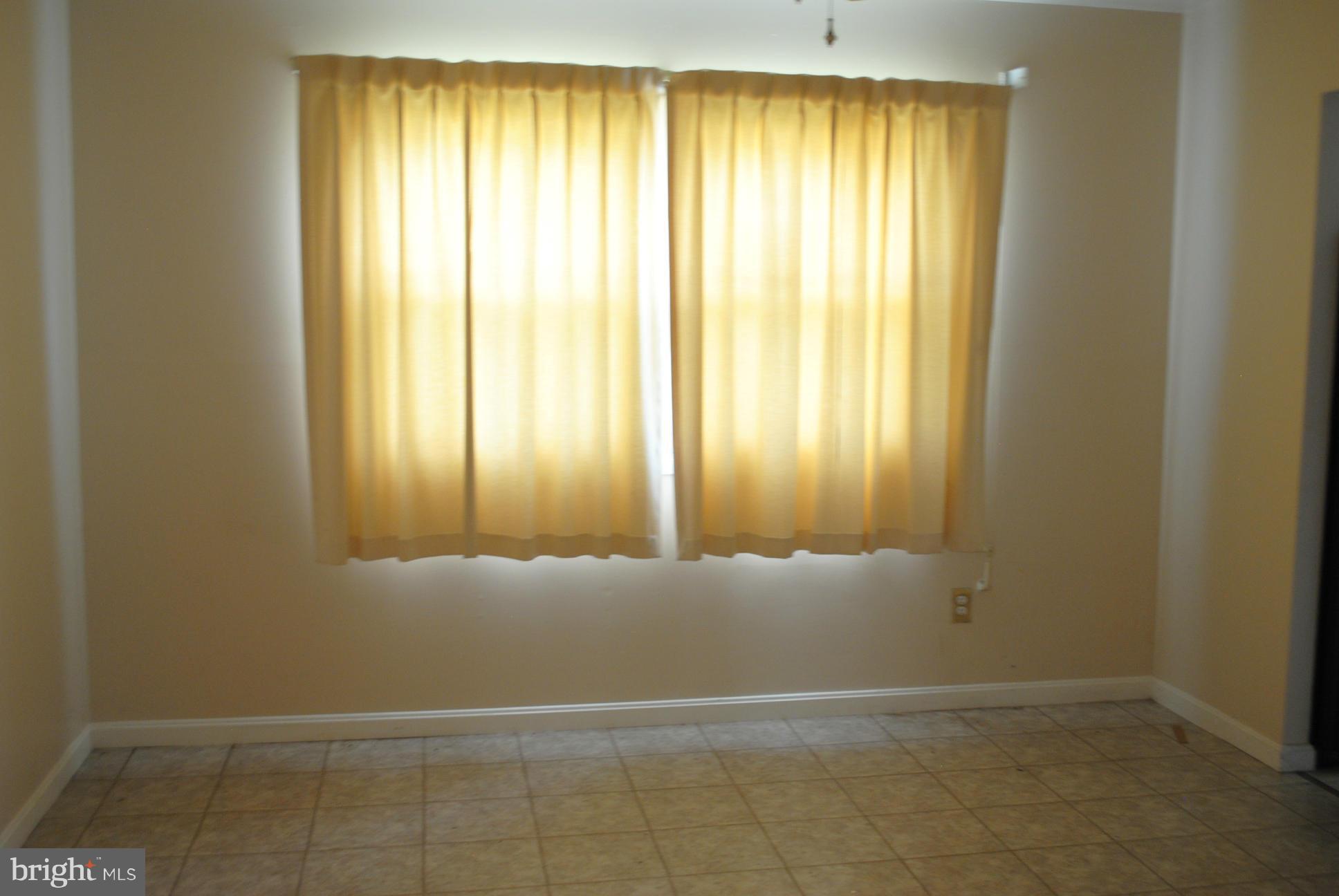1941 Winder Road Baltimore, MD 21244 - Photo 2 of 22 an empty room with window