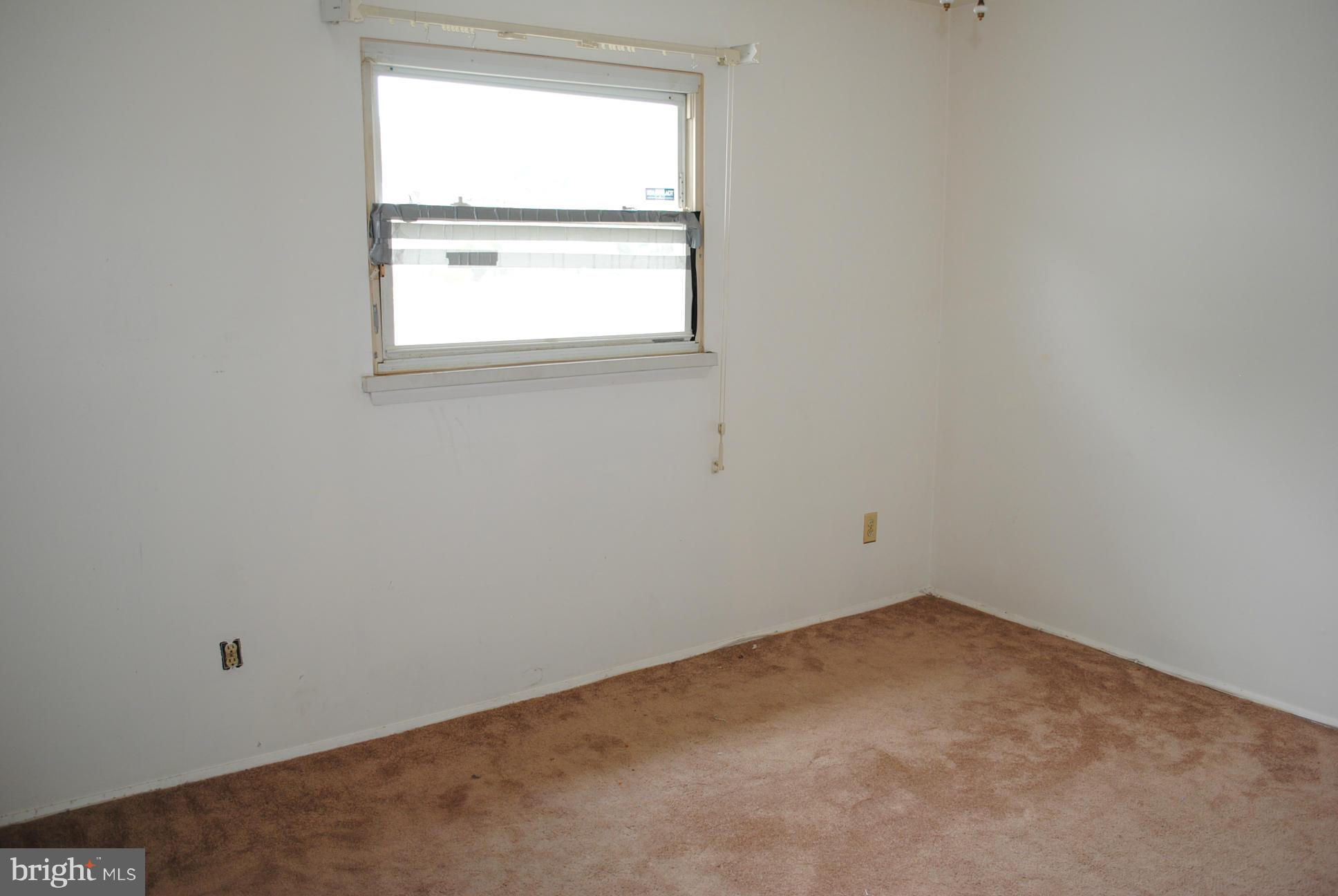 1941 Winder Road Baltimore, MD 21244 - Photo 16 of 22 an empty room with a window