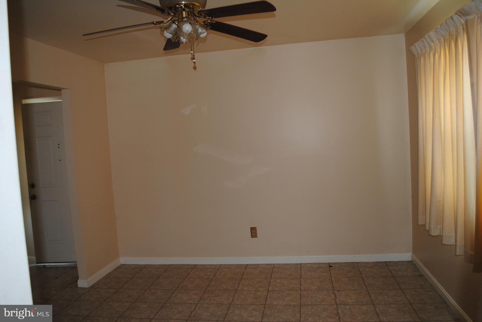 1941 Winder Road Baltimore, MD 21244 - Photo 3 of 22 an empty room with a window