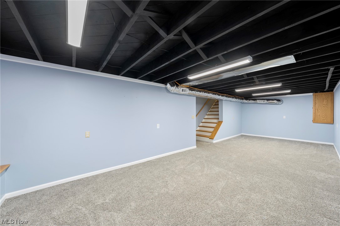 227 South Messner Road New Franklin, OH 44319 - Photo 41 of 44 Basement featuring light colored carpet