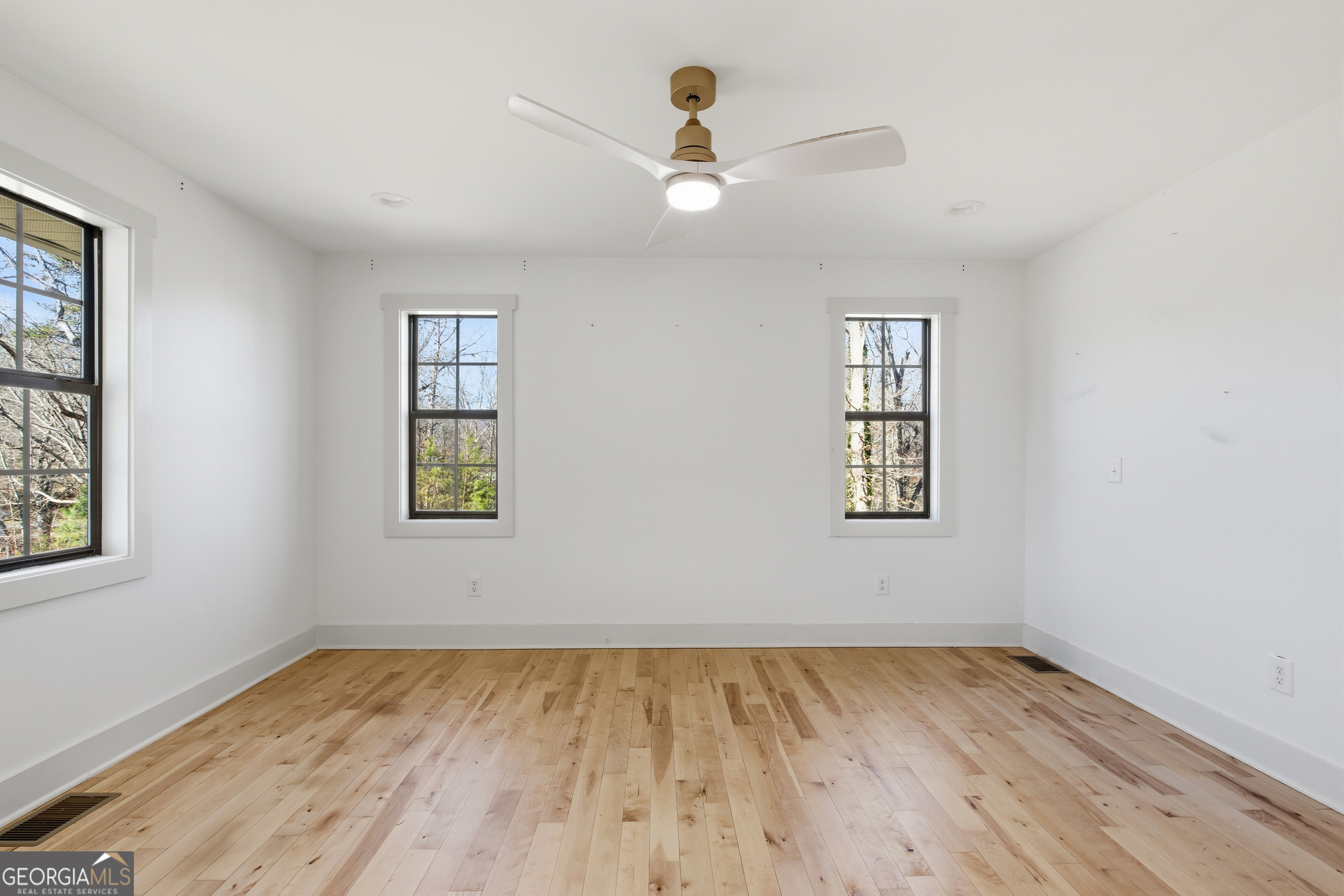 1664 Bell Gap Road Hiawassee, GA 30546 - Photo 19 of 42 wooden floor in an empty room with a window