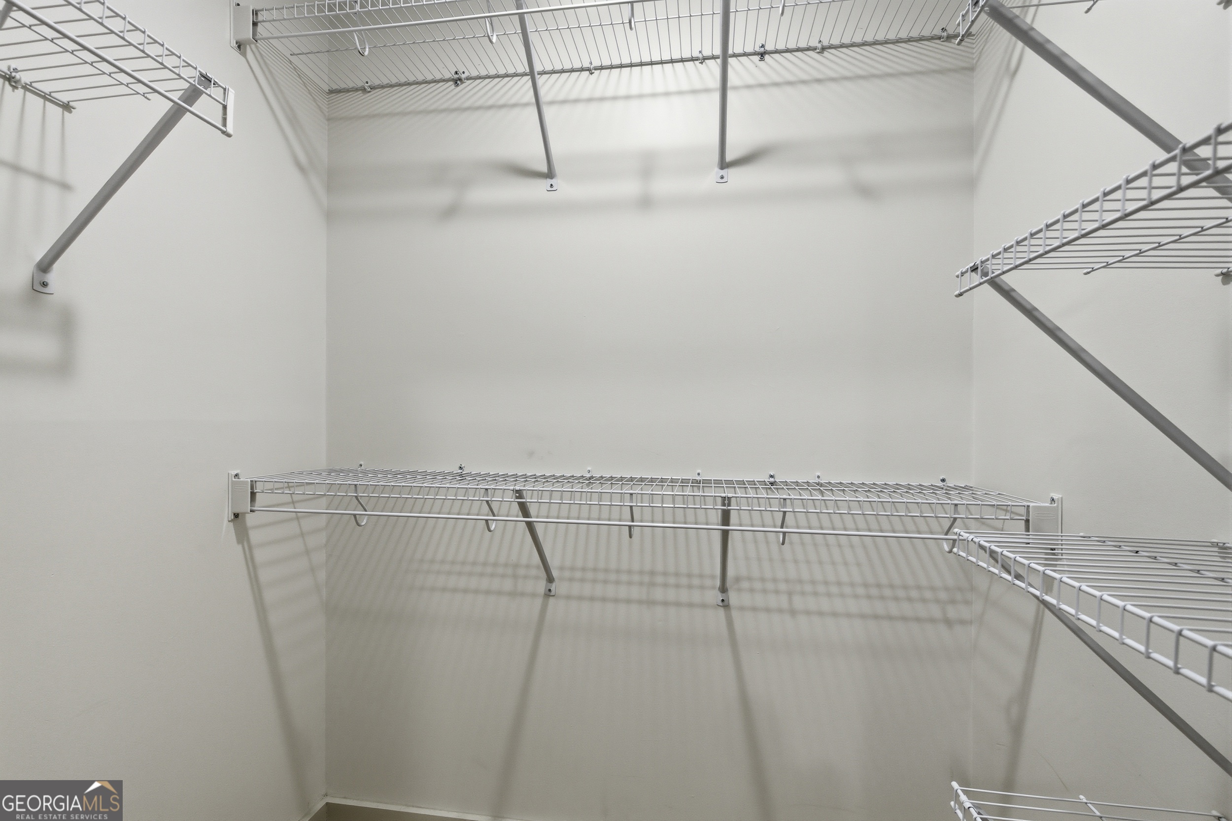 1664 Bell Gap Road Hiawassee, GA 30546 - Photo 25 of 42 a view of a room with racks on the wall