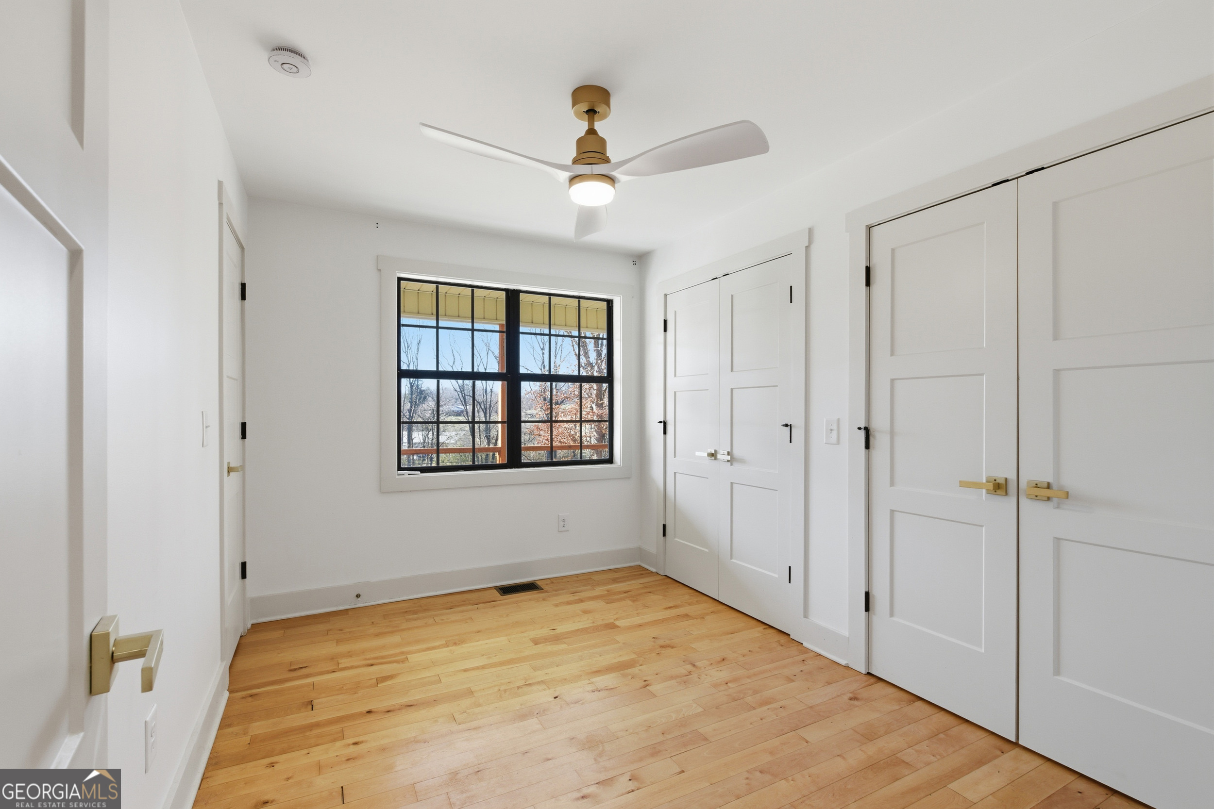 1664 Bell Gap Road Hiawassee, GA 30546 - Photo 29 of 42 a view of an empty room with a window