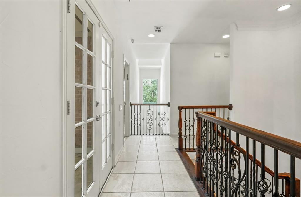 11911 Edgestone Road Dallas, TX 75230 - Photo 18 of 40 Hall featuring french doors, recessed lighting, an upstairs landing, and light tile patterned floors