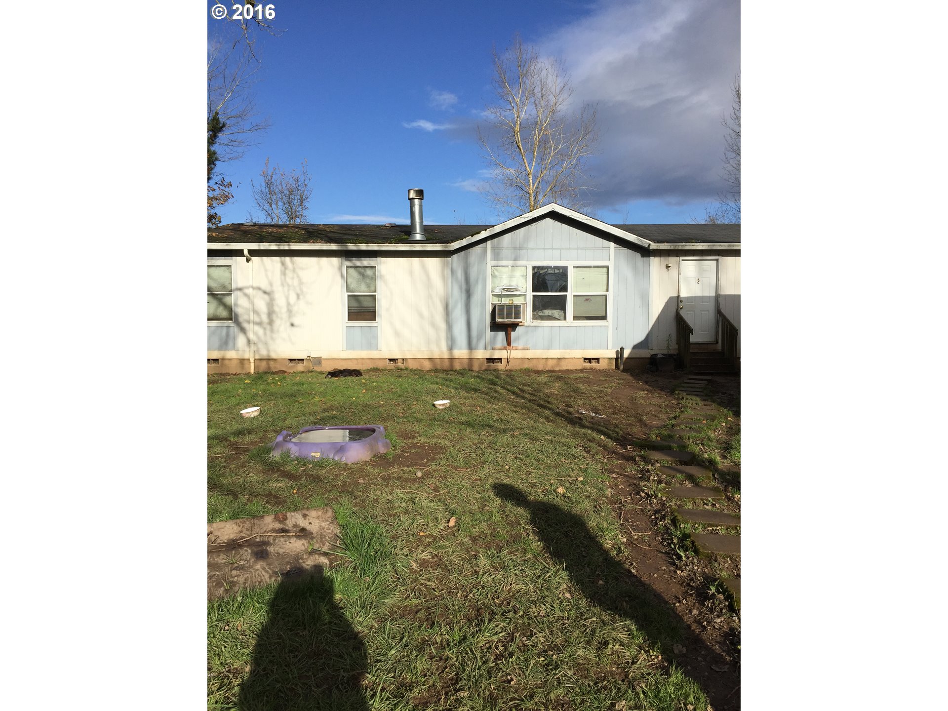 27904 South Klinger Road Canby, OR 97013 - Photo 4 of 5 a view of a house with a yard