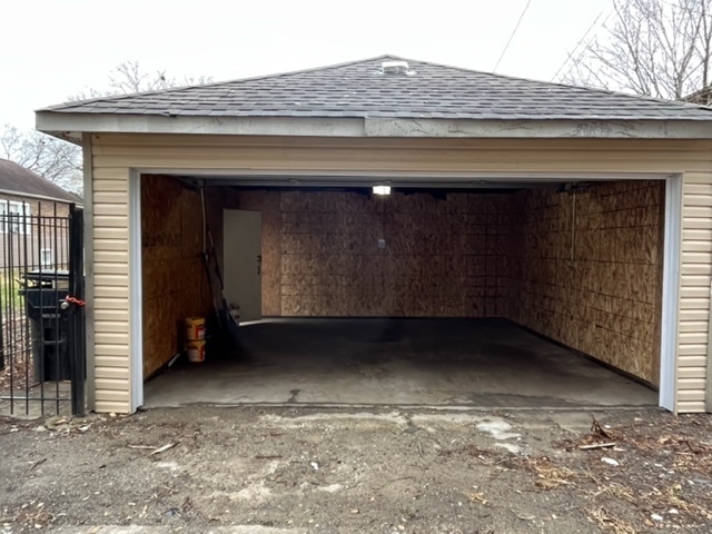7927 South Burnham Avenue Chicago, IL 60617 - Photo 11 of 11 a view of an empty room with a fireplace