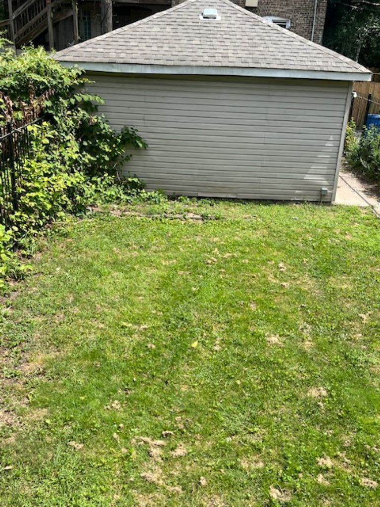 7927 South Burnham Avenue Chicago, IL 60617 - Photo 10 of 11 a view of a backyard