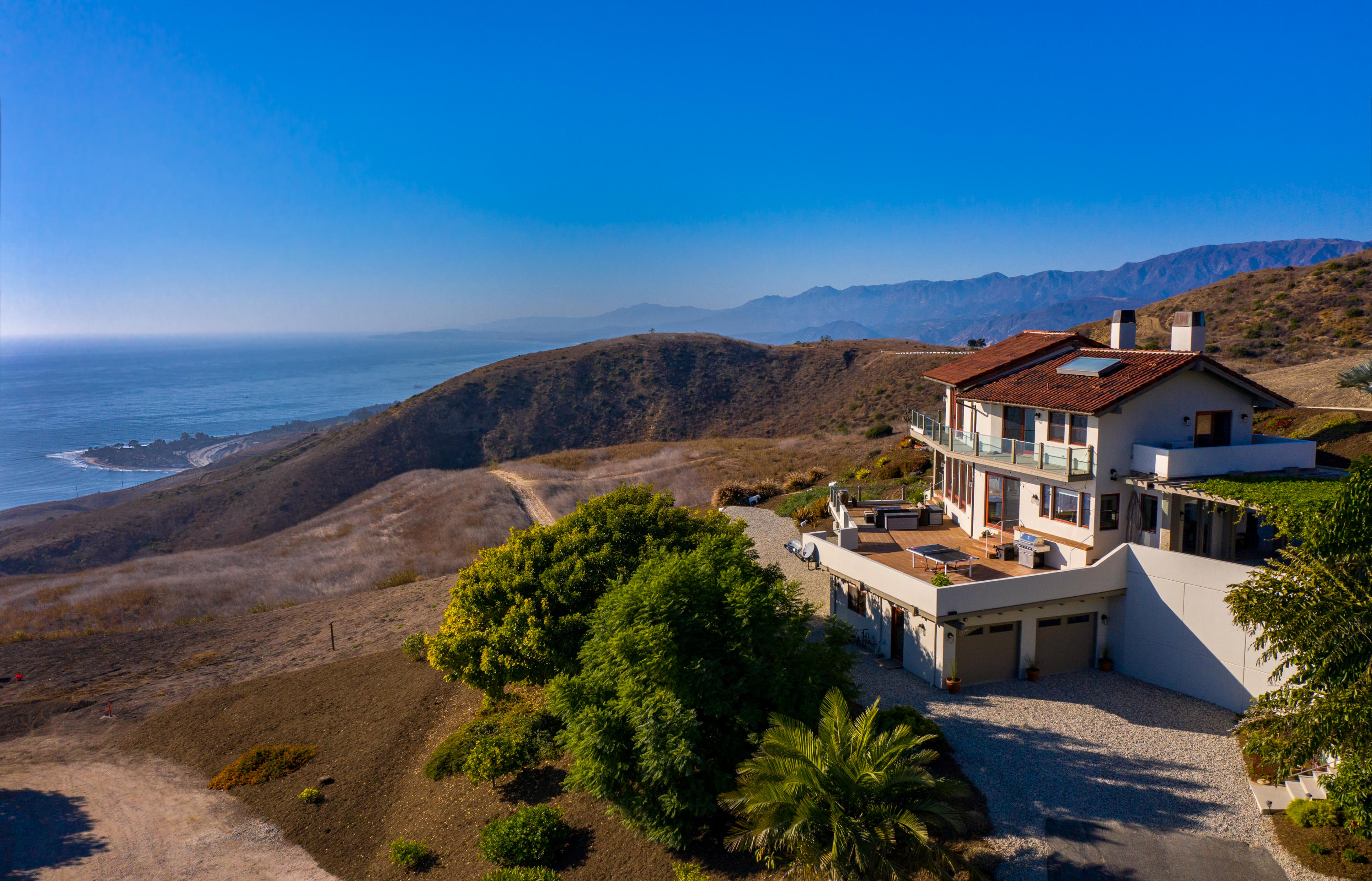 8517 Ocean View Road Ventura, CA 93001 - Photo 1 of 37 an aerial view of residential houses with outdoor space