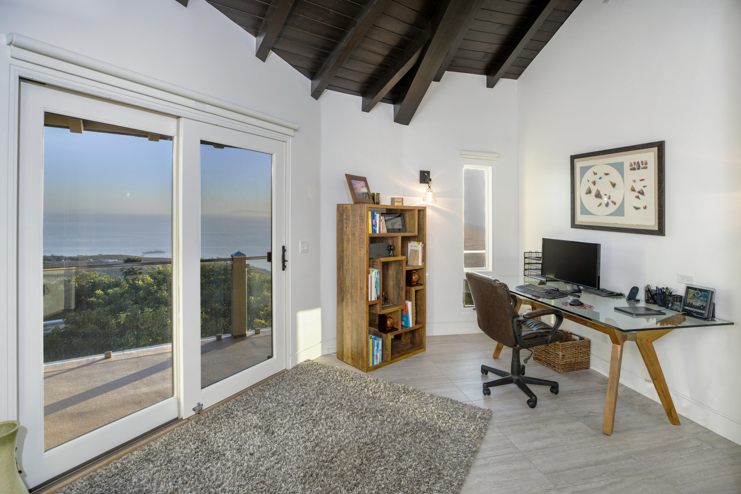 8517 Ocean View Road Ventura, CA 93001 - Photo 22 of 37 a view of a workspace with furniture