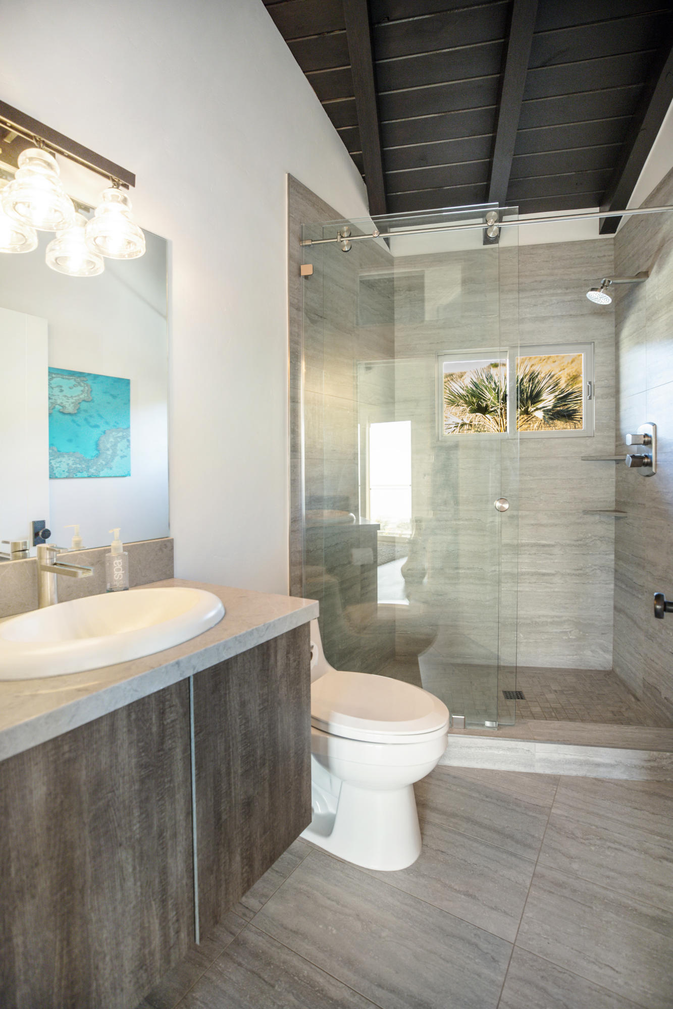 8517 Ocean View Road Ventura, CA 93001 - Photo 24 of 37 a bathroom with a sink a toilet and shower