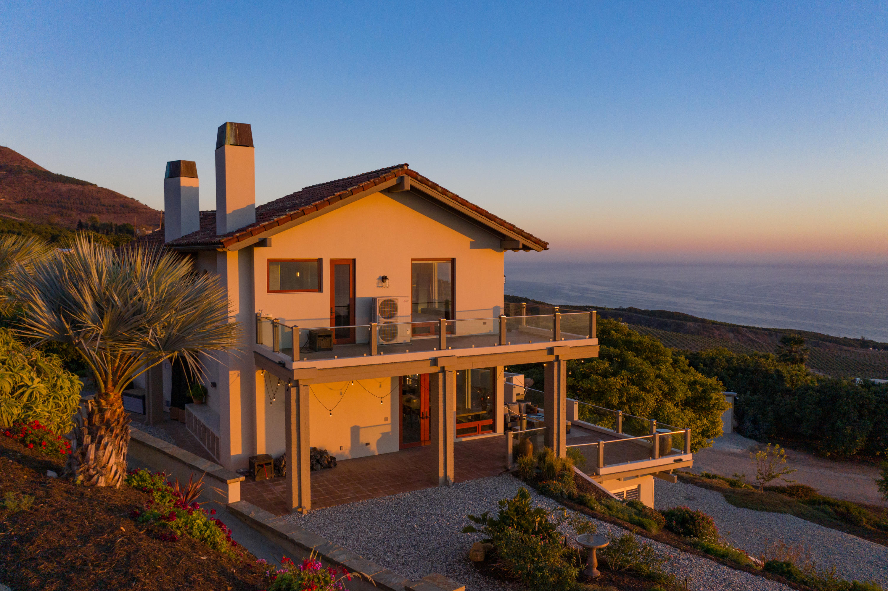 8517 Ocean View Road Ventura, CA 93001 - Photo 36 of 37 a front view of a house with a yard
