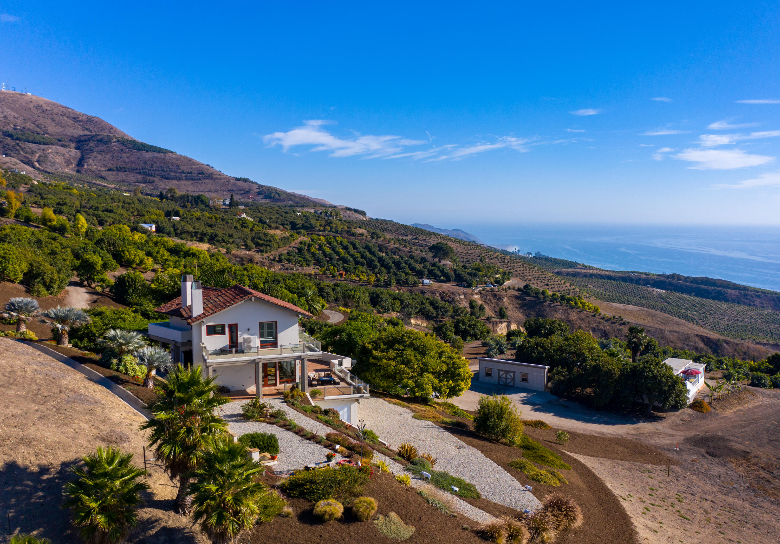 8517 Ocean View Road Ventura, CA 93001 - Photo 4 of 37 a view of a house with a yard