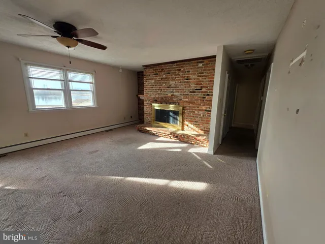 a view of a livingroom with a fireplace