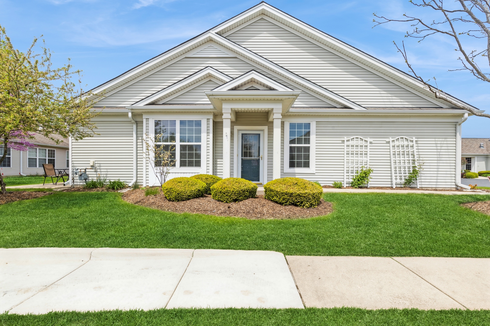 13472 Delaney Road Huntley, IL 60142 - Photo 1 of 16 a view of a house with a yard