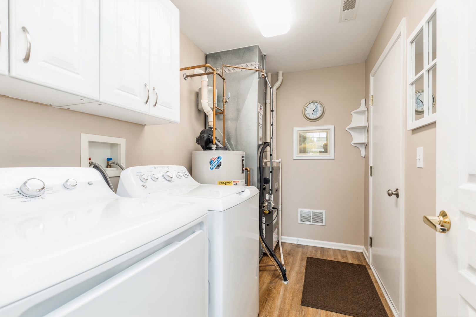 13472 Delaney Road Huntley, IL 60142 - Photo 13 of 16 a utility room with dryer and washer