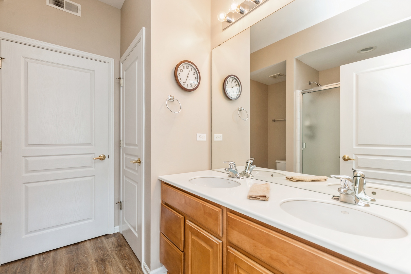 13472 Delaney Road Huntley, IL 60142 - Photo 16 of 16 a bathroom with a sink and a mirror